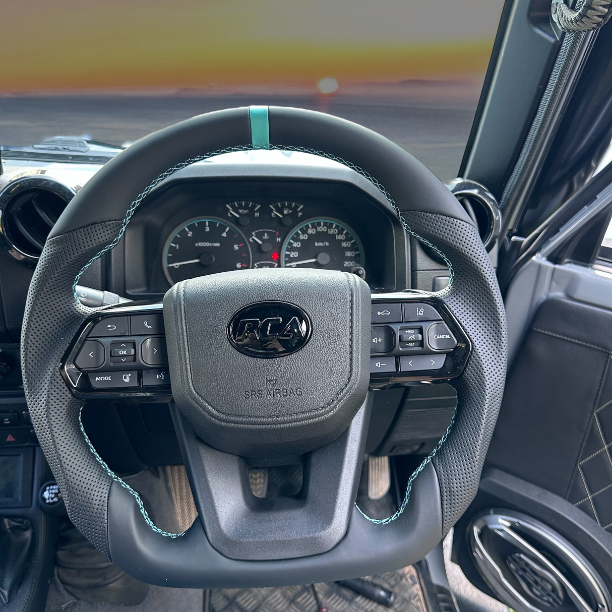 Teal Titan Toyota Steering Wheel | Flat-Bottom, Leather, Plug & Play | October Dispatch