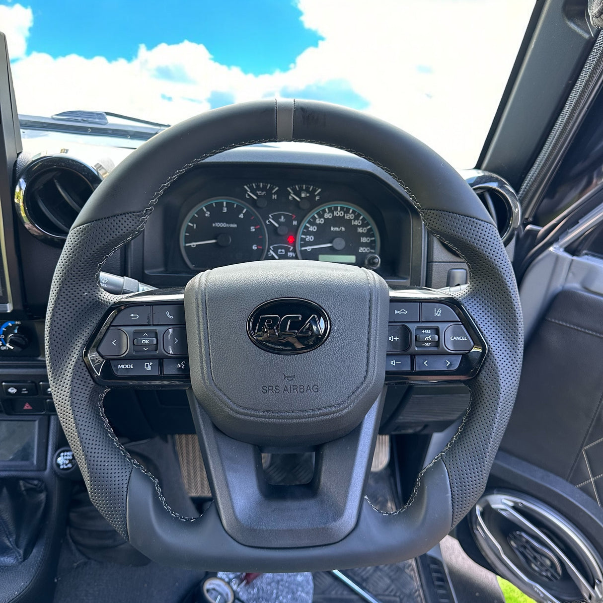 Grey Guardian Flat-Bottom Steering Wheel for Toyota LandCruiser, Hilux, Prado & More - Q4 Pre Order