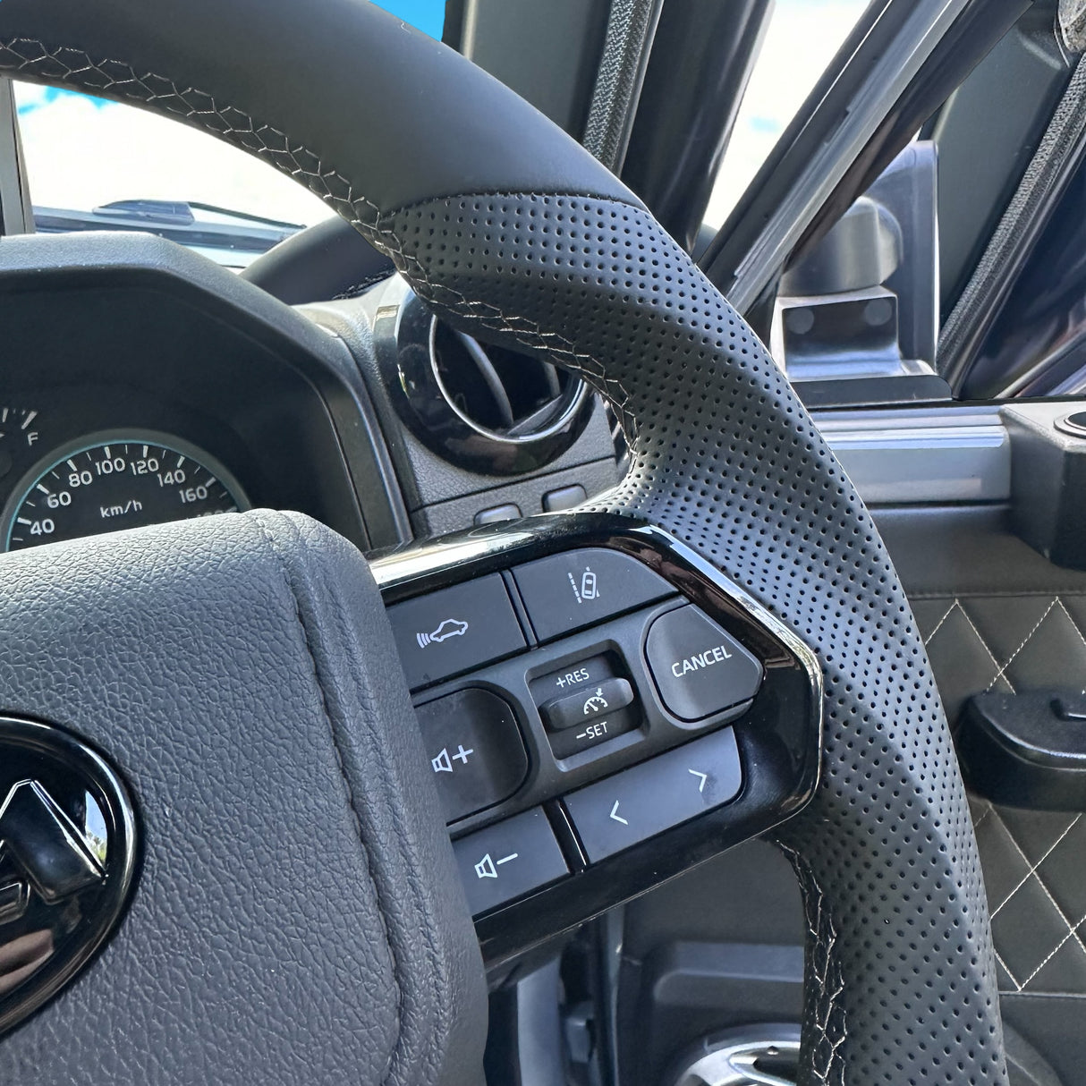 Grey Guardian Flat-Bottom Steering Wheel for Toyota LandCruiser, Hilux, Prado & More - Q4 Pre Order