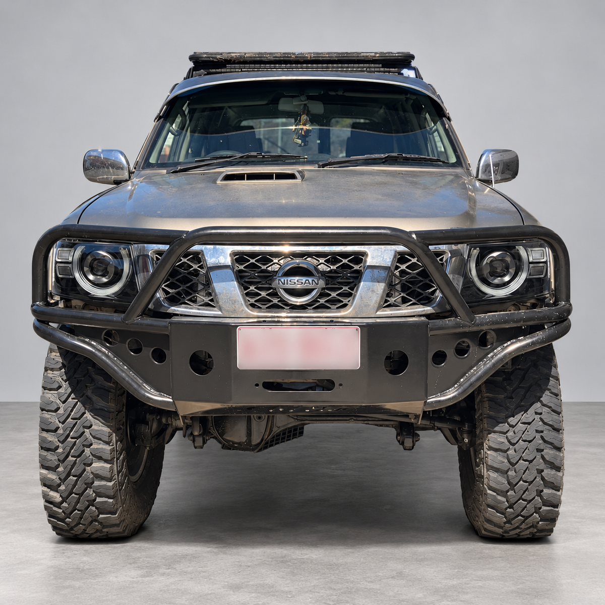 Front view of Nissan Patrol GU Y61 showing LED headlight fitment