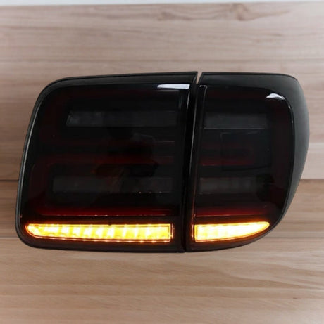 Nissan Patrol Y62 LED Tail Lights (Series 1–4) – Smoked, Plug & Play Upgrade