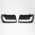 LandCruiser 100/105 Series bi-LED headlights — left and right pair on white background