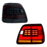 Toyota LandCruiser 100 & 105 Series LED Tail Lights (1998–2007) – Smoked Plug & Play Pair