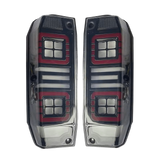 LED Tail Lights for Toyota LandCruiser 78 Series Troop Carrier (2007–2025) – Smoked, Plug & Play, Start-Up Animation