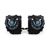 Facelift 70 Series LandCruiser Bi-LED projector headlight retrofit kit with ice-blue DRL ring