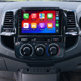 hilux 2010 manual head unit with left-side controls — illustrative installation