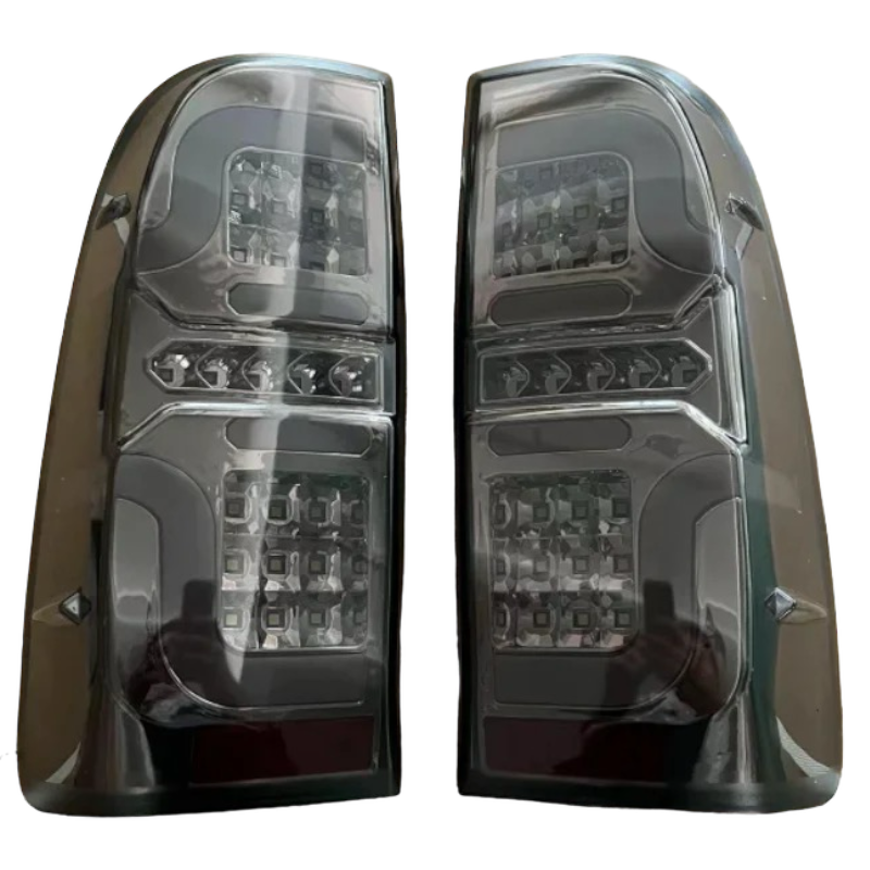 Hilux N70 smoked LED tail light close-up, lit showing brake and indicator