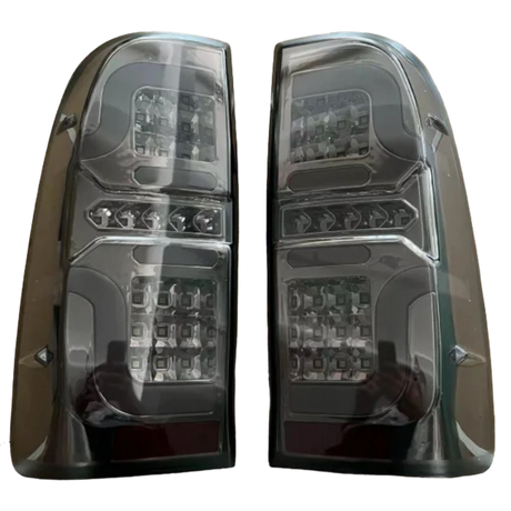 Hilux N70 smoked LED tail light close-up, lit showing brake and indicator