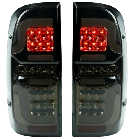 Hilux N70 smoked LED tail lights, factory connector and mounting
