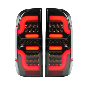 Hilux N70 smoked LED tail lights installed, left and right pair