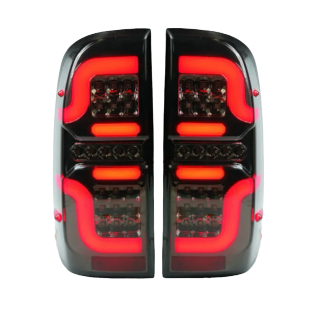 Hilux N70 smoked LED tail lights installed, left and right pair