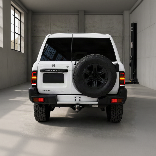Nissan GU Patrol Series 1-3 Wagon rear end with smoked LED tail lights installed, lights off