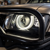 Nissan Patrol GU Y61 LED headlight installed behind bullbar